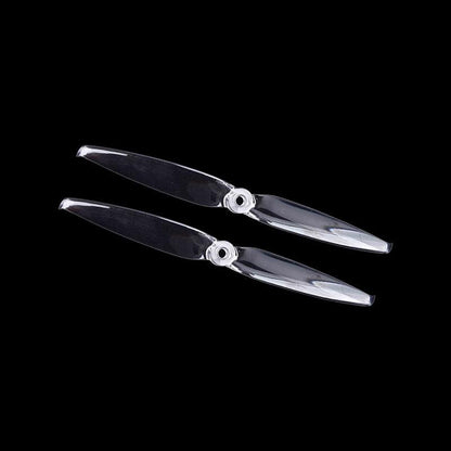 Clear two-blade propeller pair with hub detail, translucent finish on black background