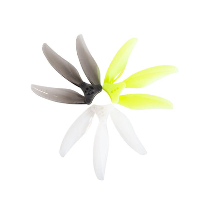 Gemfan Floppy Proppy 4019-3 folding 3-blade propellers shown in smoke gray, neon yellow, and clear