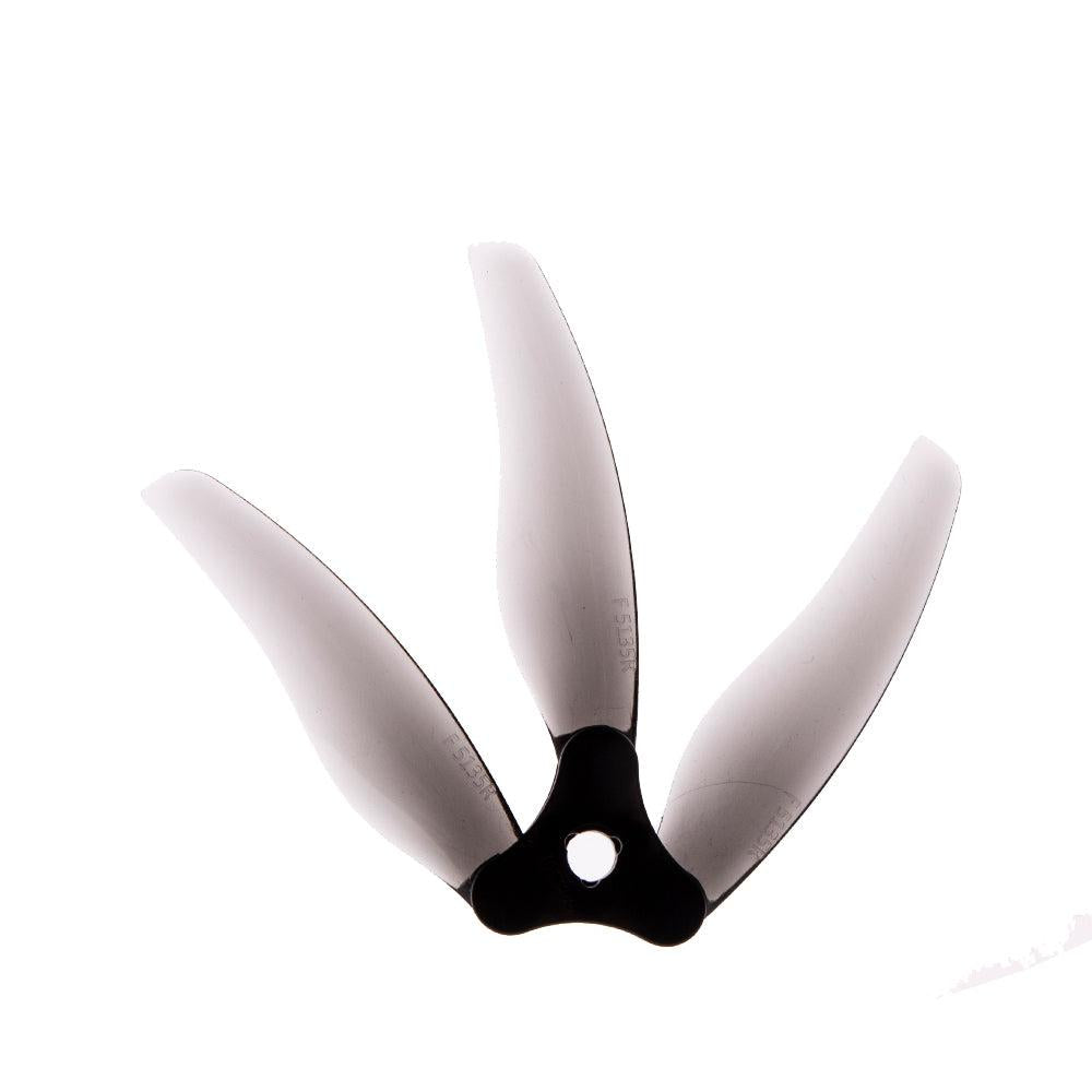 Smoke gray folding 3-blade propeller with black hub, centered mounting hole