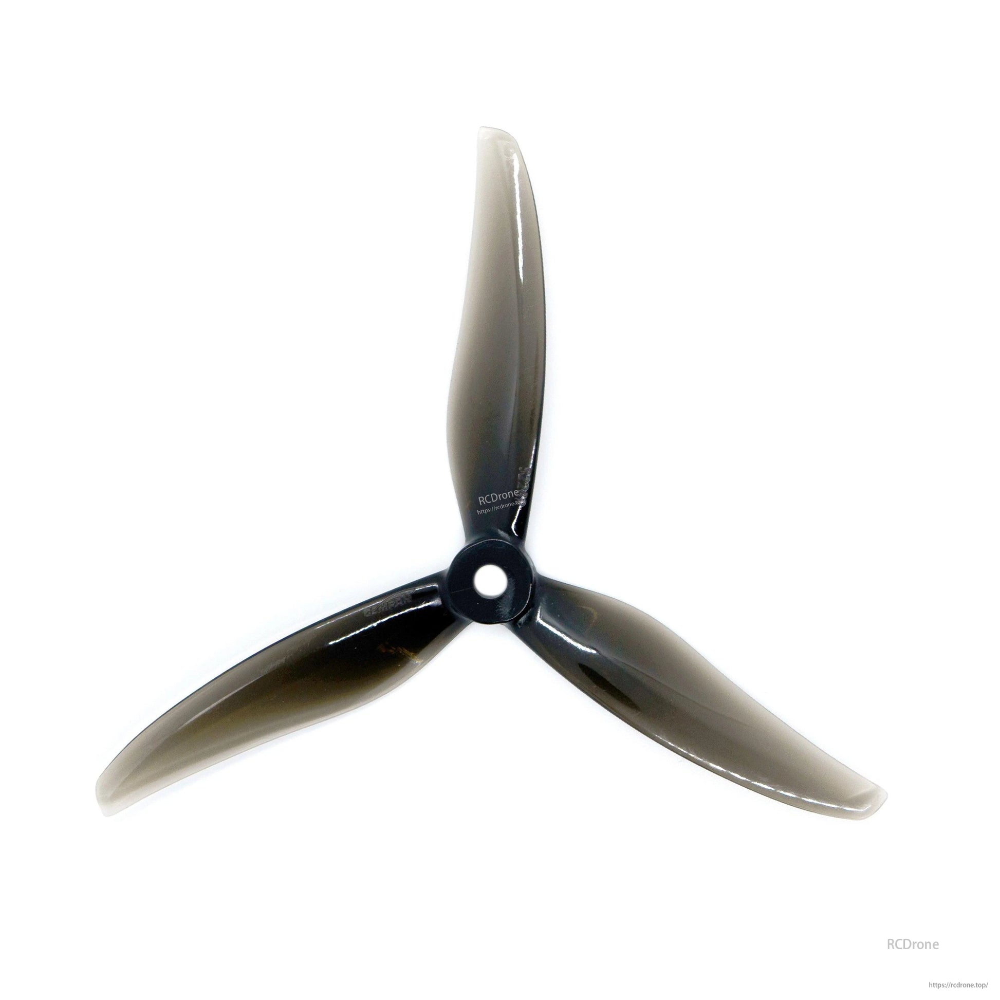Smoke gray 3-blade drone propeller, top-down view highlighting curved blades