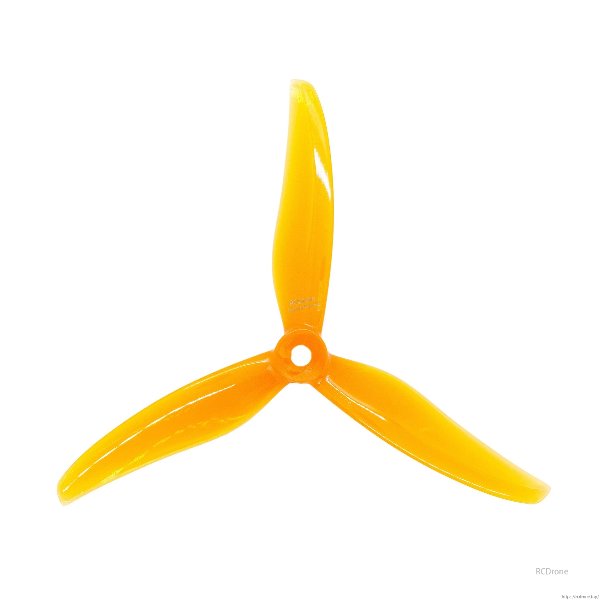 Orange 3-blade FPV propeller, top view showing blade shape and hub opening