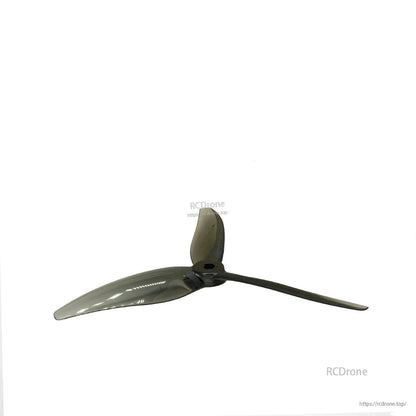 Smoke black tri-blade propeller side profile showing blade pitch and hub