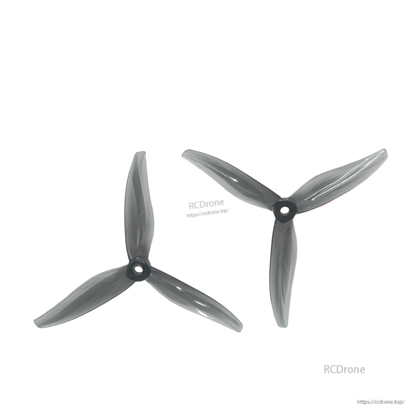 Pair of smoke black tri-blade propellers displayed on white background