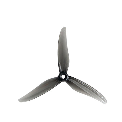 Gemfan Fury 5131.0 PC 3-blade 5in propeller in smoke gray, top view with center hub