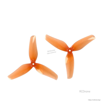 Orange 2-inch 3-blade T-mount propellers, two-piece set shown from different angles