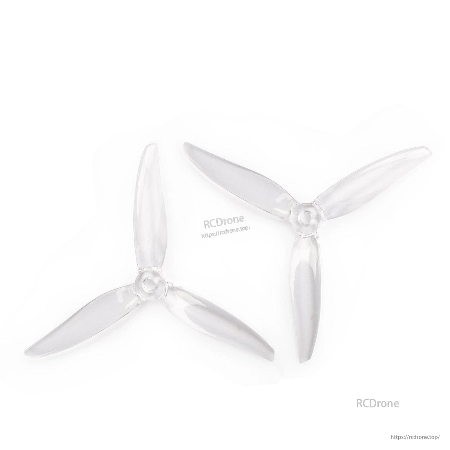 Two clear translucent 3-blade propellers shown together, CW and CCW pair