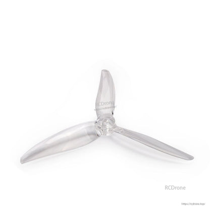Clear translucent 3-blade drone propeller angled view, transparent hub