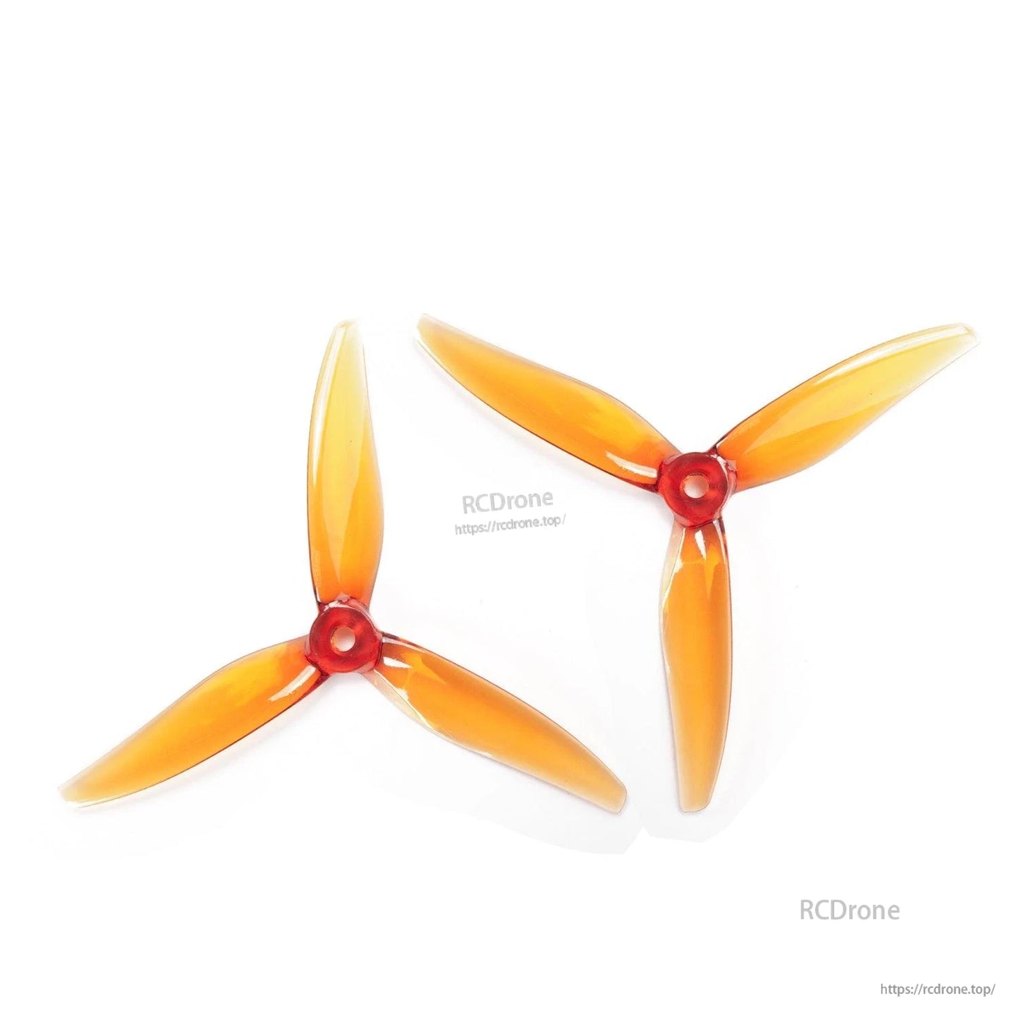 Two orange 3-blade propellers shown together, translucent orange blades with red hubs