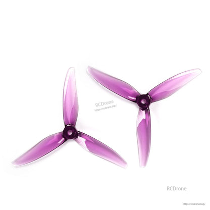Two purple translucent 3-blade propellers shown together (CW and CCW pair)