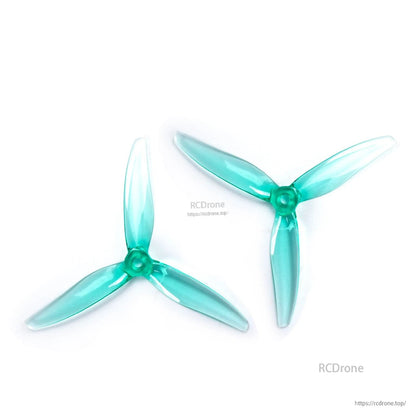 Two teal translucent 3-blade propellers shown together, matching CW/CCW pair