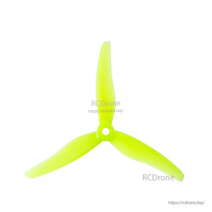Neon yellow 3-blade FPV propeller, front view showing 5mm center hub
