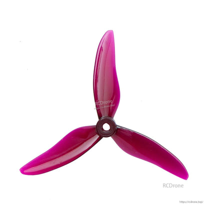 Translucent magenta 3-blade propeller with dark hub, top view