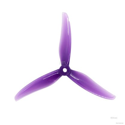 Three-blade propeller in translucent purple, top view showing hub opening and blade profile