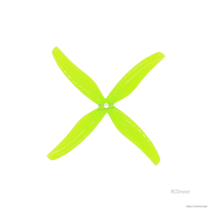 Single neon yellow 4-blade propeller, top view with center mounting hole