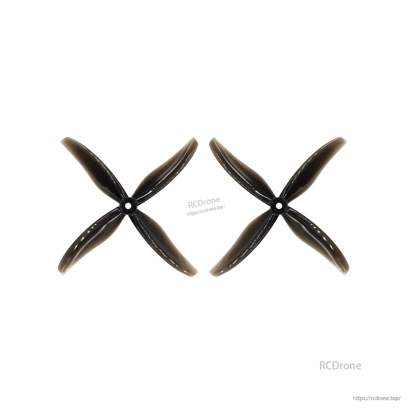 Pair of midnight gray 4-blade propellers laid side by side, matching rotation set (2 props)