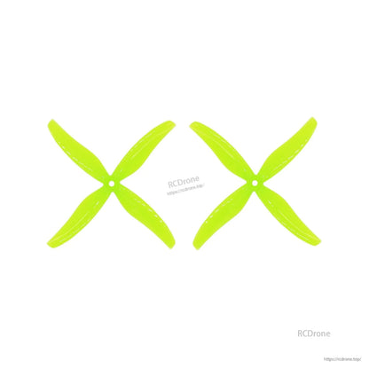 Pair of neon yellow 4-blade propellers laid side by side, matching rotation set (2 props)