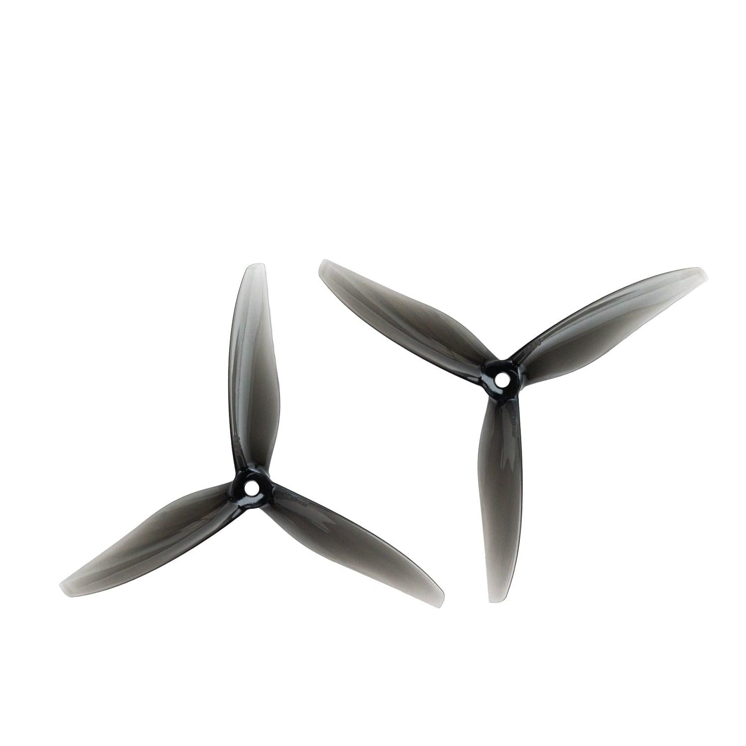 Set of two Gemfan Hurricane 6045-3 6x4.5 3-blade propellers, smoke gray, showing opposite rotation