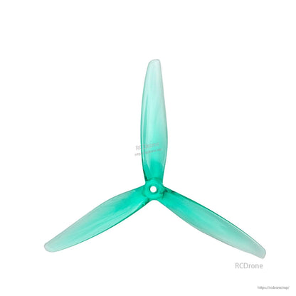 Single clear green 3-blade propeller with center mounting hole, front view on white background