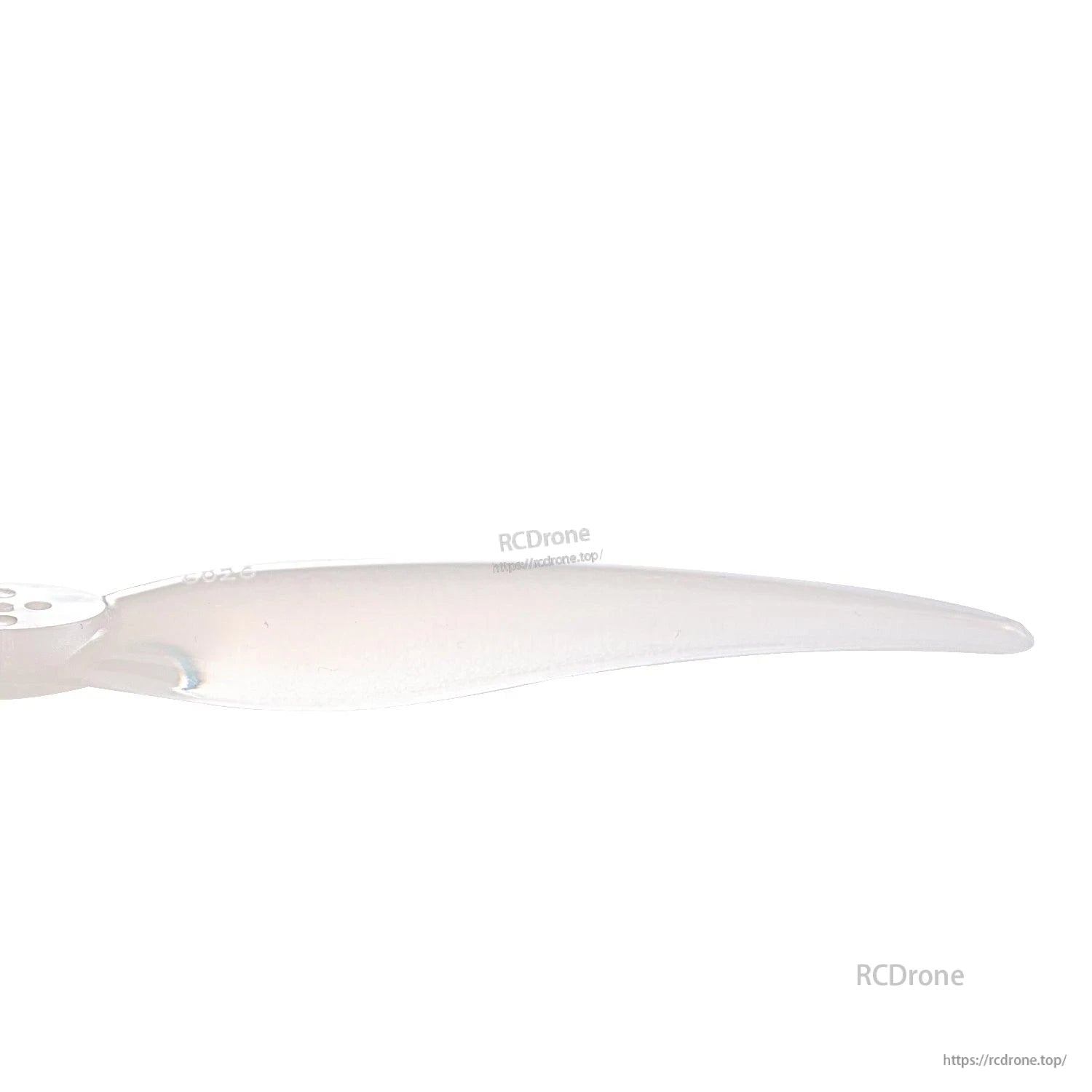 Close-up of clear propeller blade section showing leading edge and surface finish