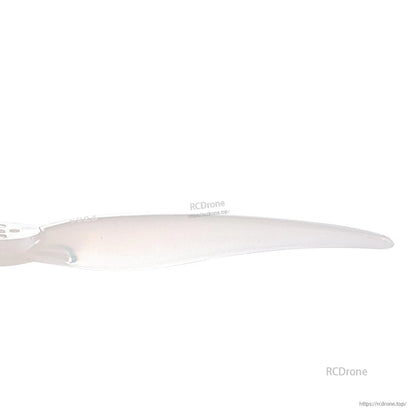 Close-up of clear propeller blade section showing leading edge and surface finish