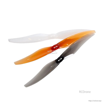 Three propellers overlapped at an angle, showing clear, orange, and smoke gray options