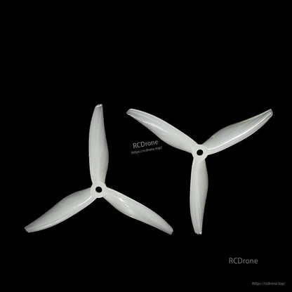 Pair of white 3-blade propellers (CW and CCW) on black background, matching set