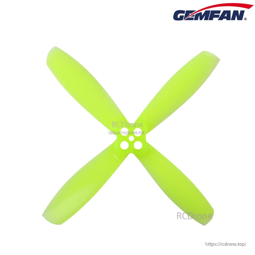 Neon green four-blade RotorX 2535-style propeller, top view with 2-hole hub