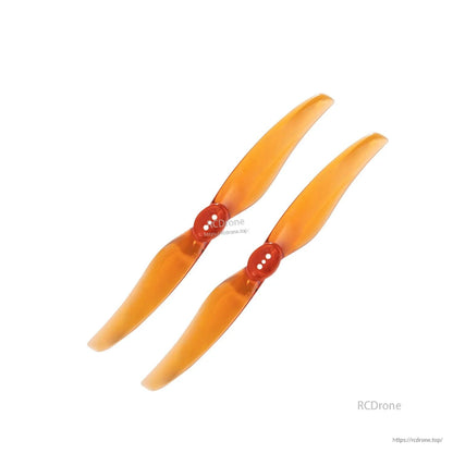 Two orange two-blade propellers, paired set view for drone build spares