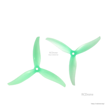 Mint green 3-blade propellers pair, top view showing tri-blade shape and center hub