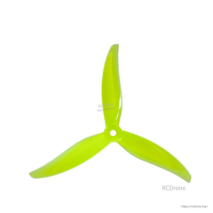 Single neon yellow 3-blade propeller, top view with 5mm hub opening