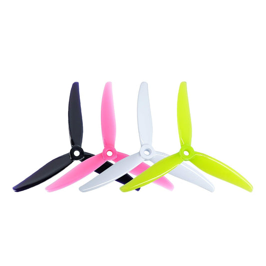 Gemfan SBANG 4935 freestyle 3-blade FPV propellers shown in black, pink, white, and neon yellow