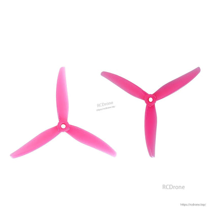 Pink 3-blade FPV propellers pair, two prop orientations on white background