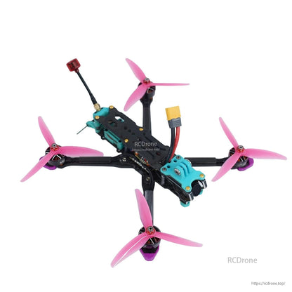 FPV quadcopter example with pink 3-blade propellers installed, top-down view