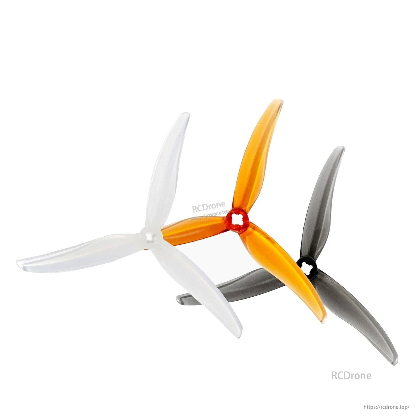Gemfan SL 5130 3-blade propeller color options shown together: clear, amber, and smoke