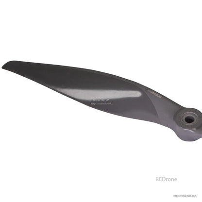 Blade tip close-up showing leading edge curve and glossy finish