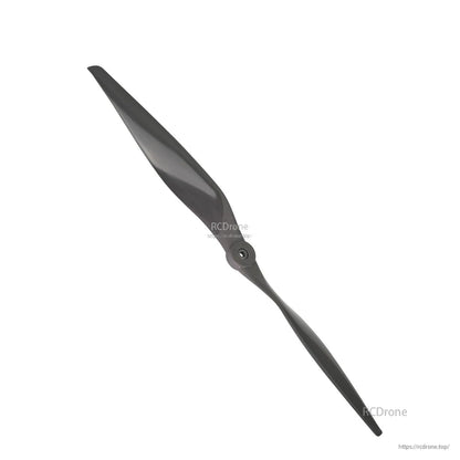 Diagonal view of two-blade RC airplane propeller highlighting blade sweep and hub