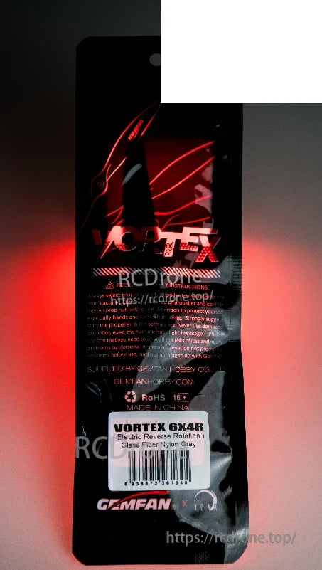 Packaging label close-up showing VORTEX 6x4R text and material note on bag