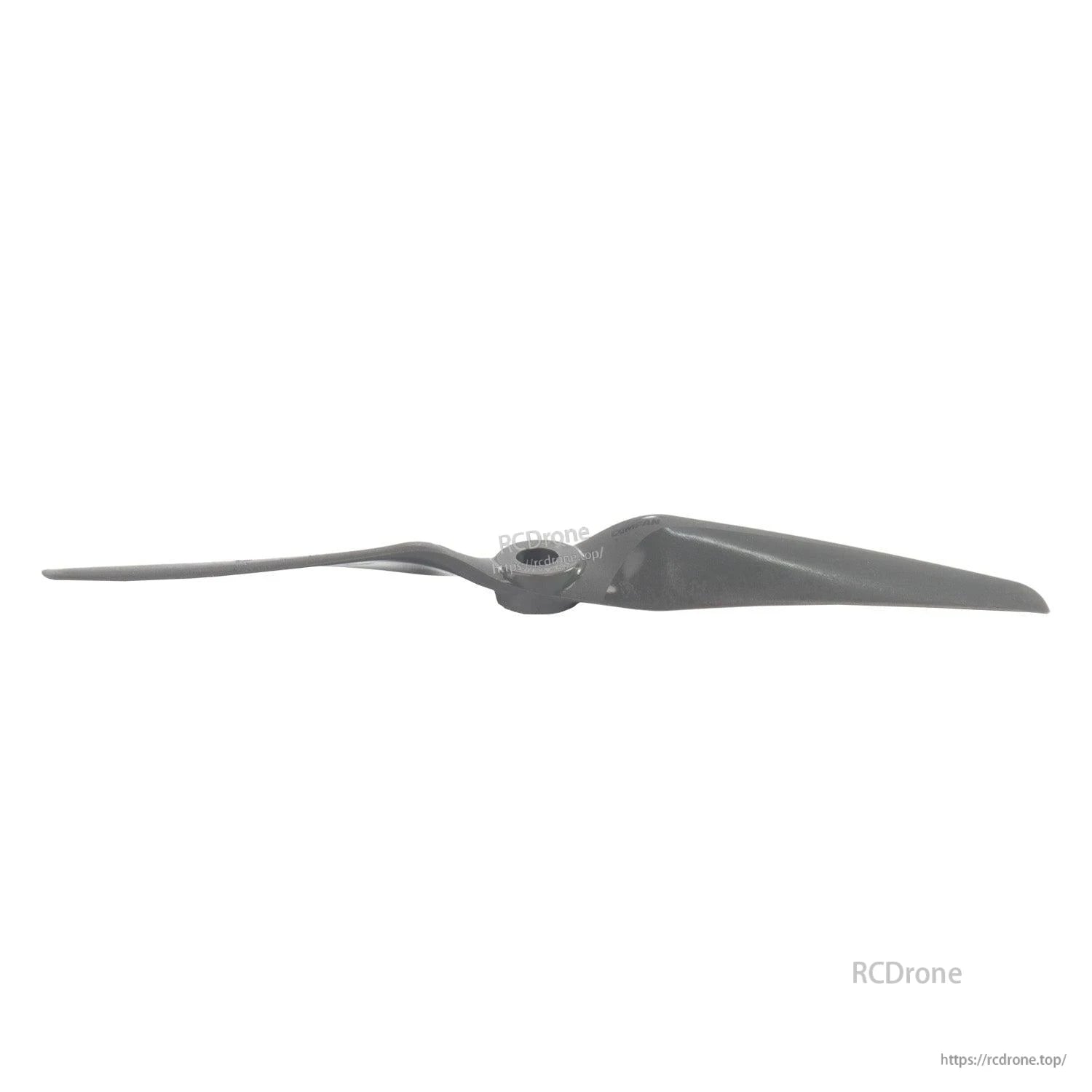 Low-angle view of propeller showing hub height and blade twist from the side