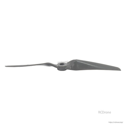 Low-angle view of propeller showing hub height and blade twist from the side