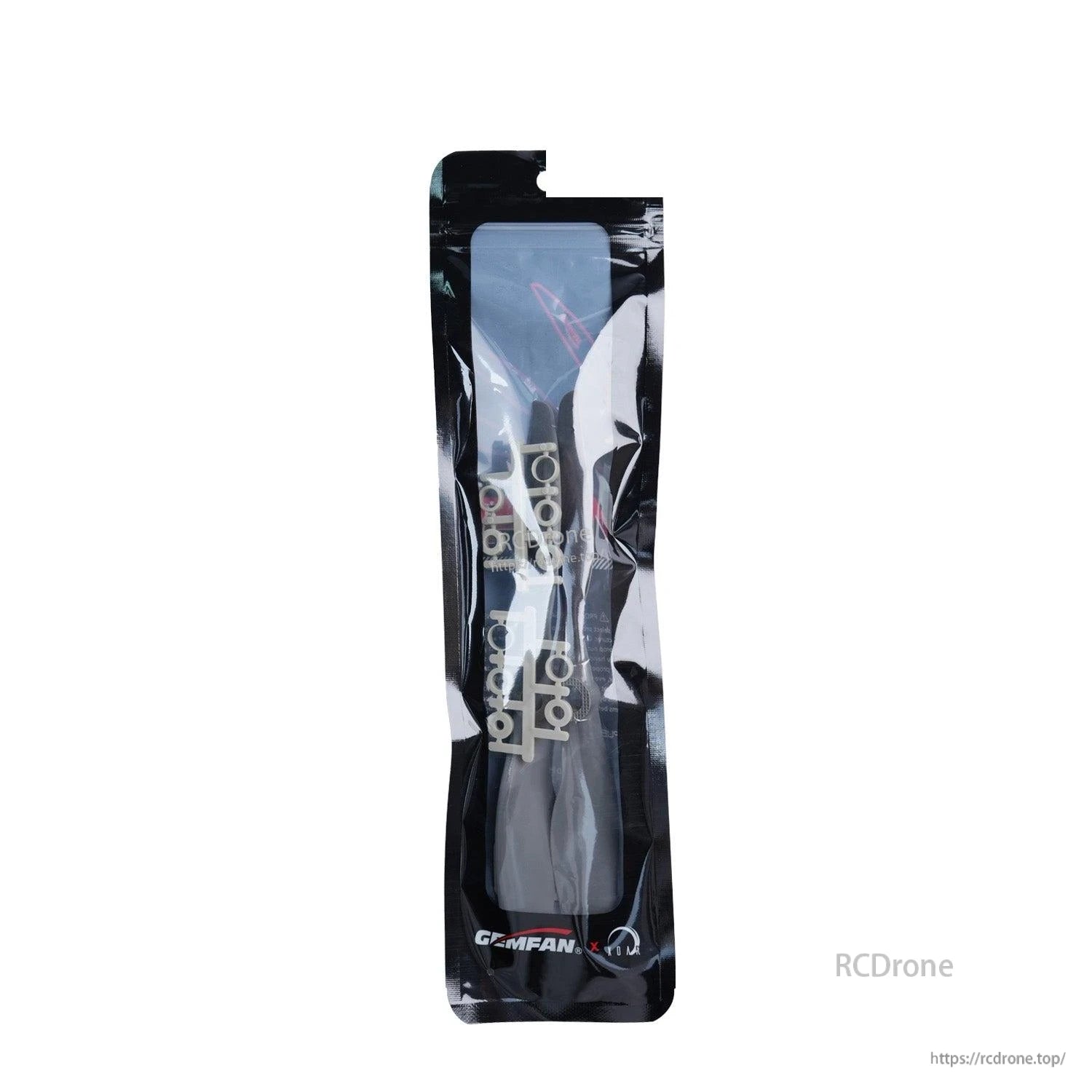 Close-up of sealed Gemfan propeller package showing branding and contents through clear window