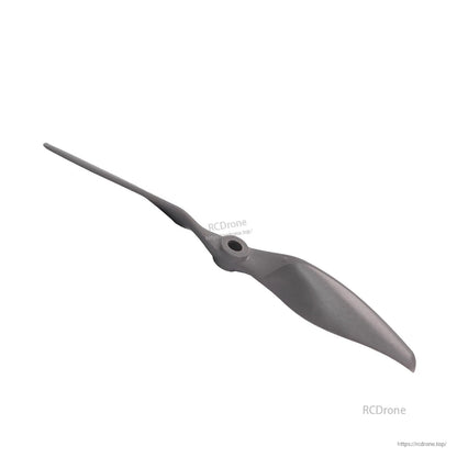 Angled side perspective of two-blade propeller showing airfoil profile and hub thickness