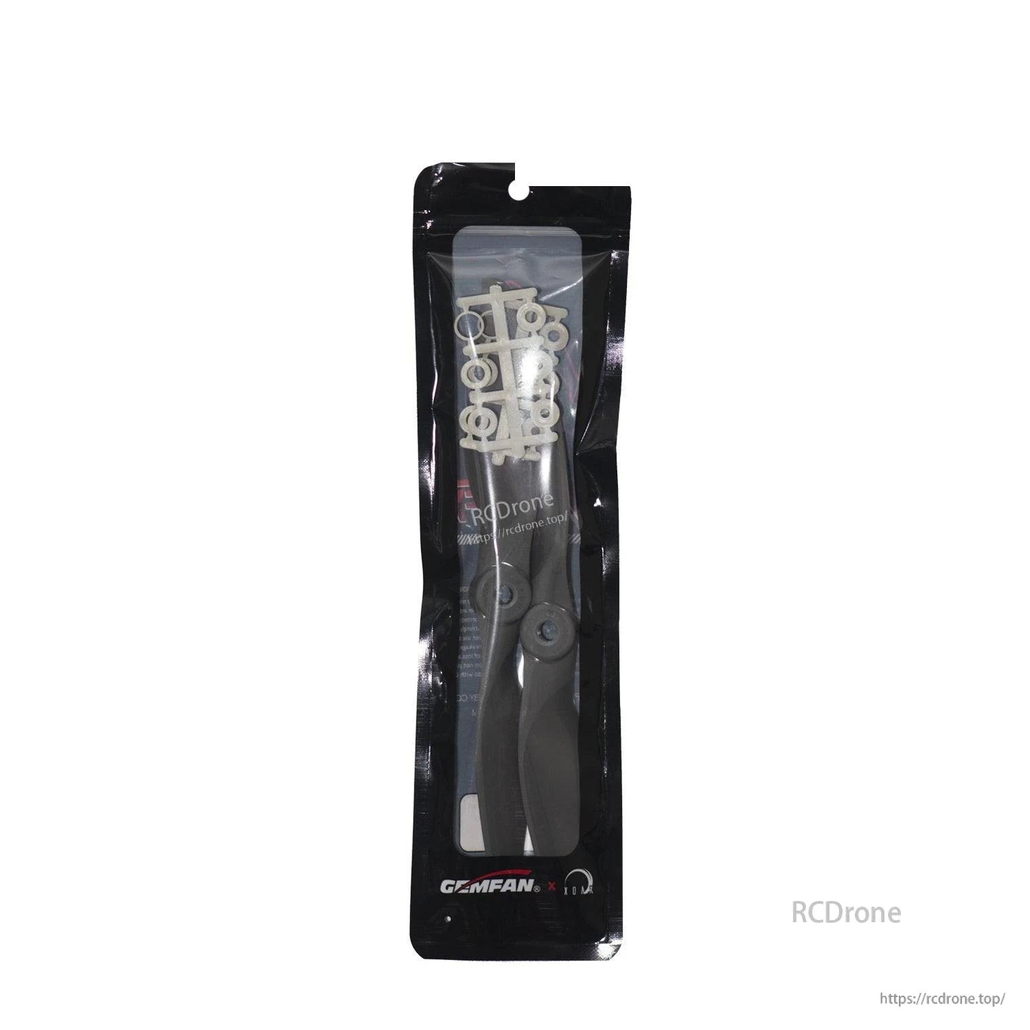 Gemfan propellers in sealed retail pouch with small mounting hardware visible inside