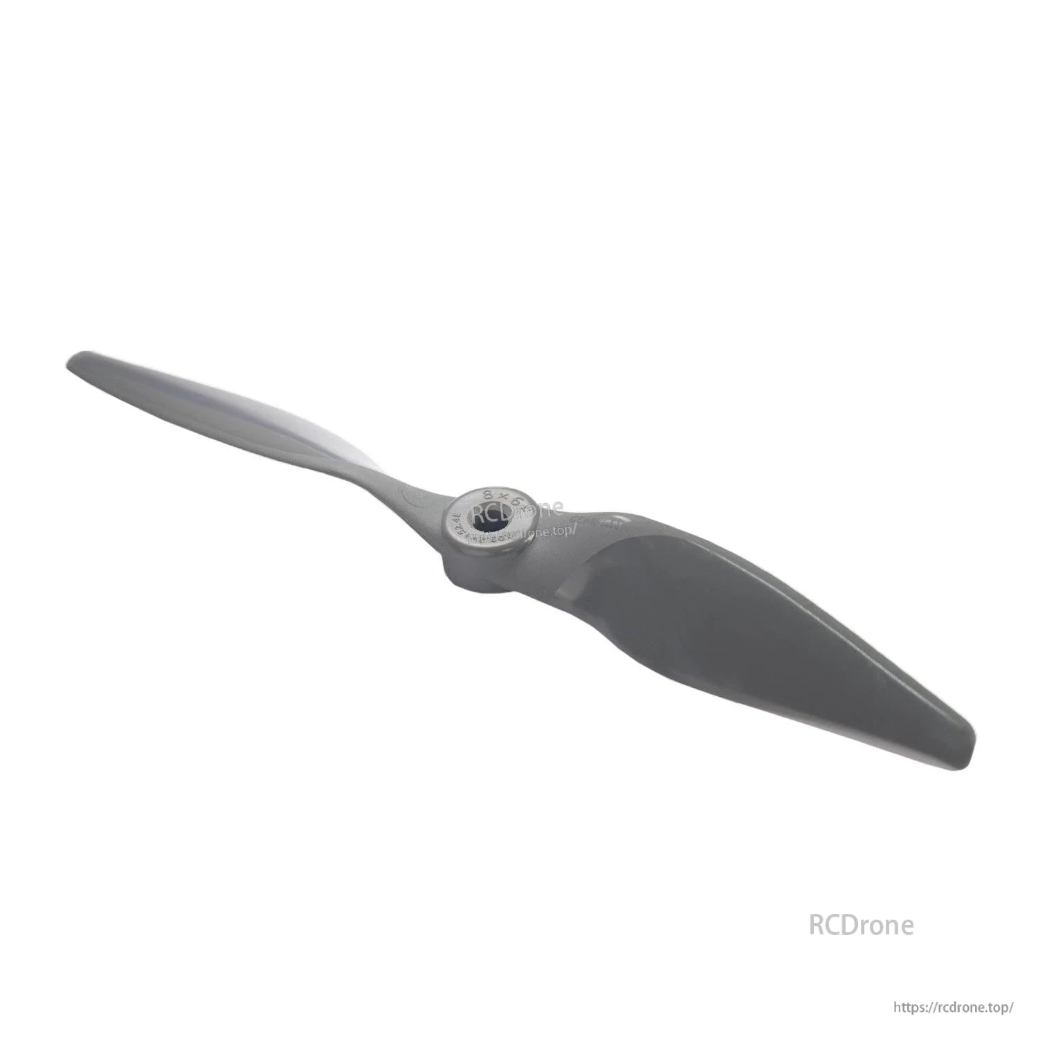 Angled close-up of propeller hub and mounting hole on gray 2-blade prop