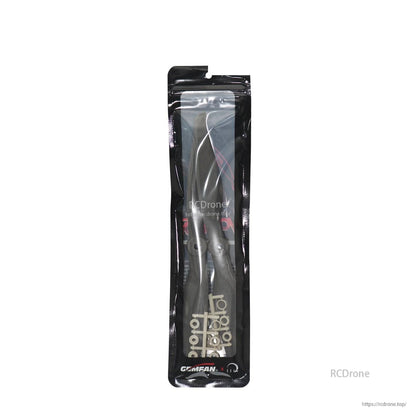 Sealed Gemfan propeller pack showing two blades and accessory rings inside