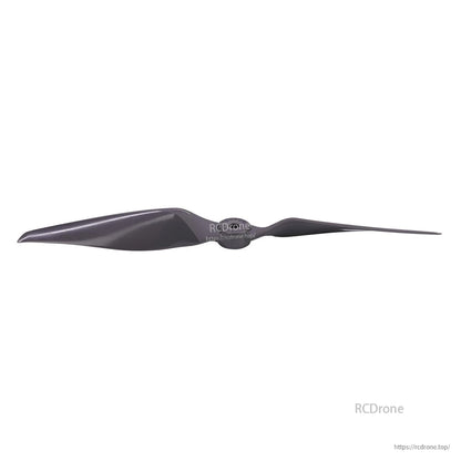 Low-angle edge-on view of propeller showing thin blade profile and center hub