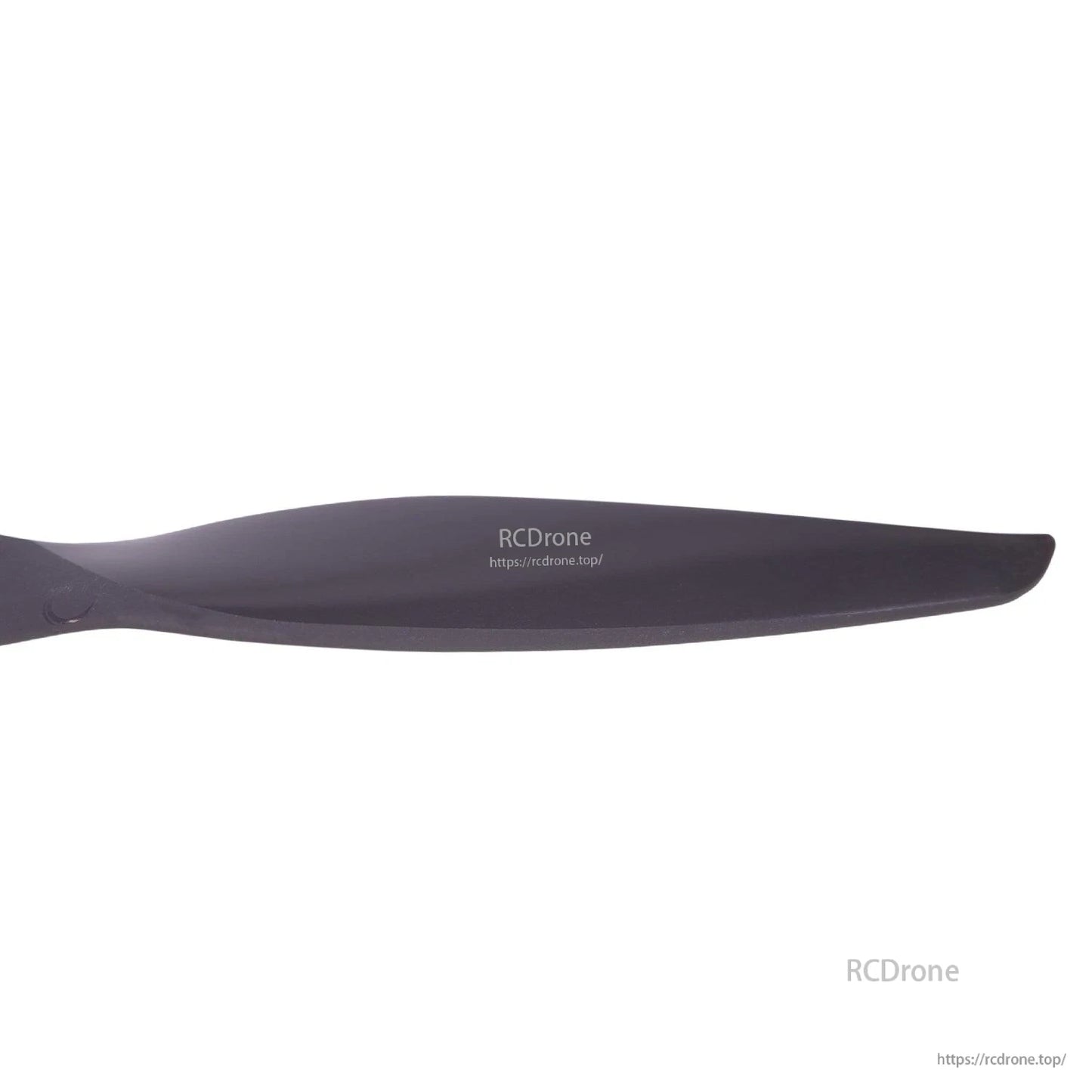 Close-up of propeller blade tip and leading edge profile on dark nylon prop