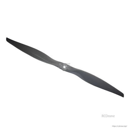 Angled view of black two-blade propeller highlighting twist and swept blade shape