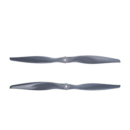 Pair of black 15x12 electric propellers shown together, opposite rotation set (E and R)