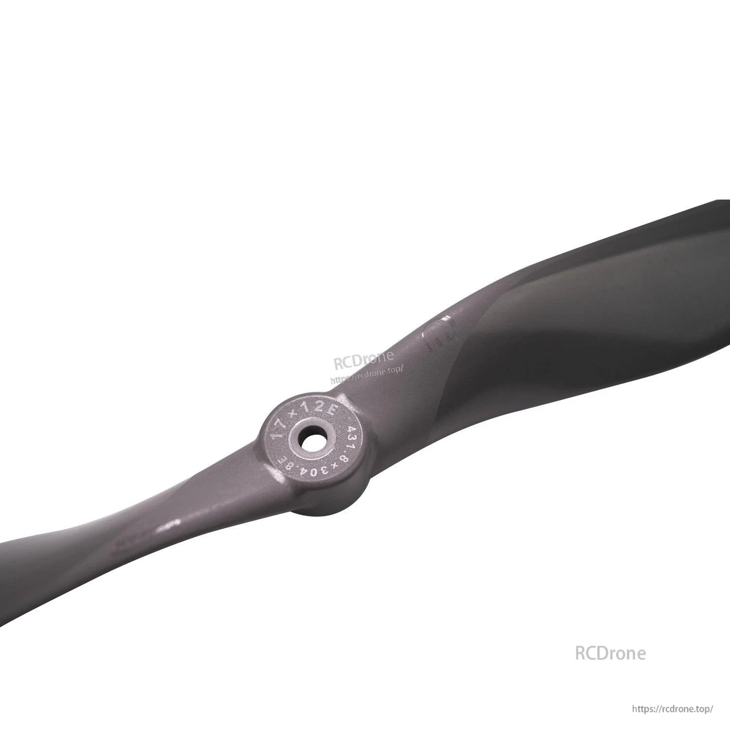 Close-up of prop hub with 17x12E size marking and 6.35mm center bore opening