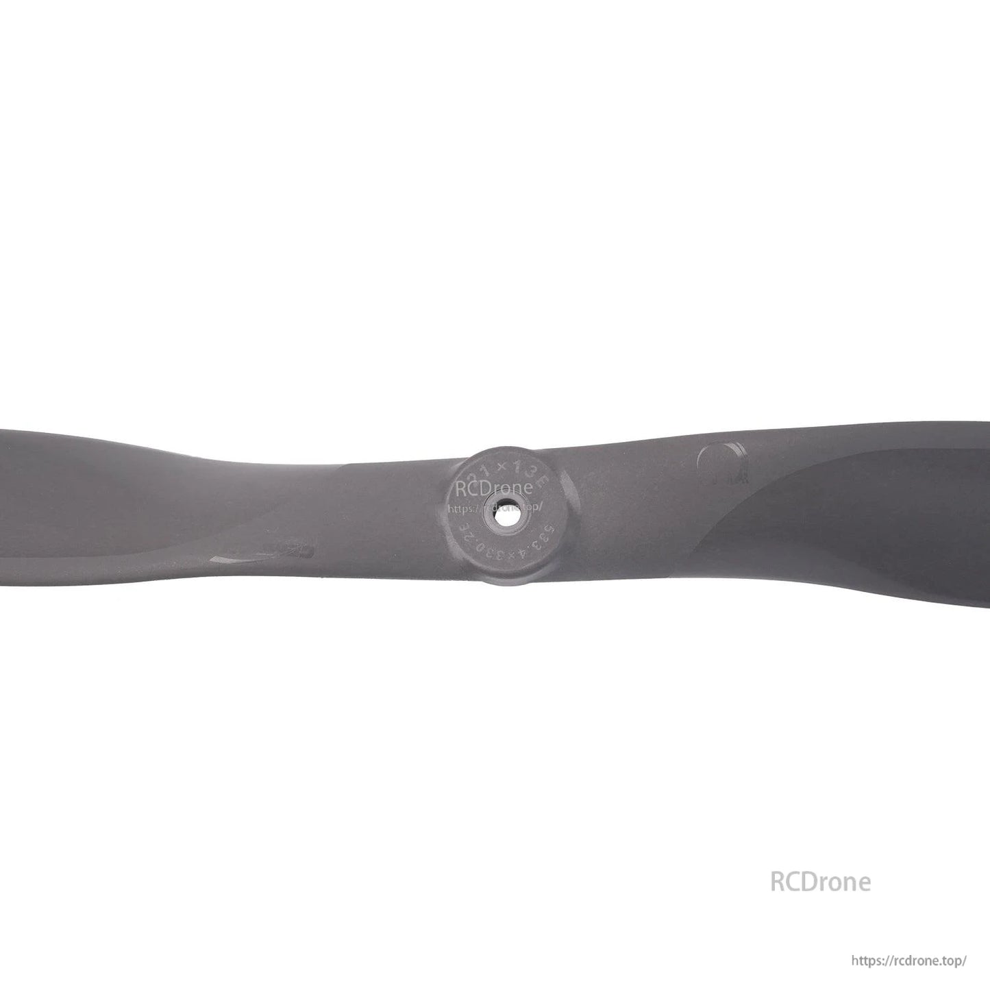 Close-up of propeller hub with mounting hole and molded size marking on center ring